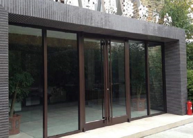 柯豐木業(yè)專注高端木門定制生產廠家=